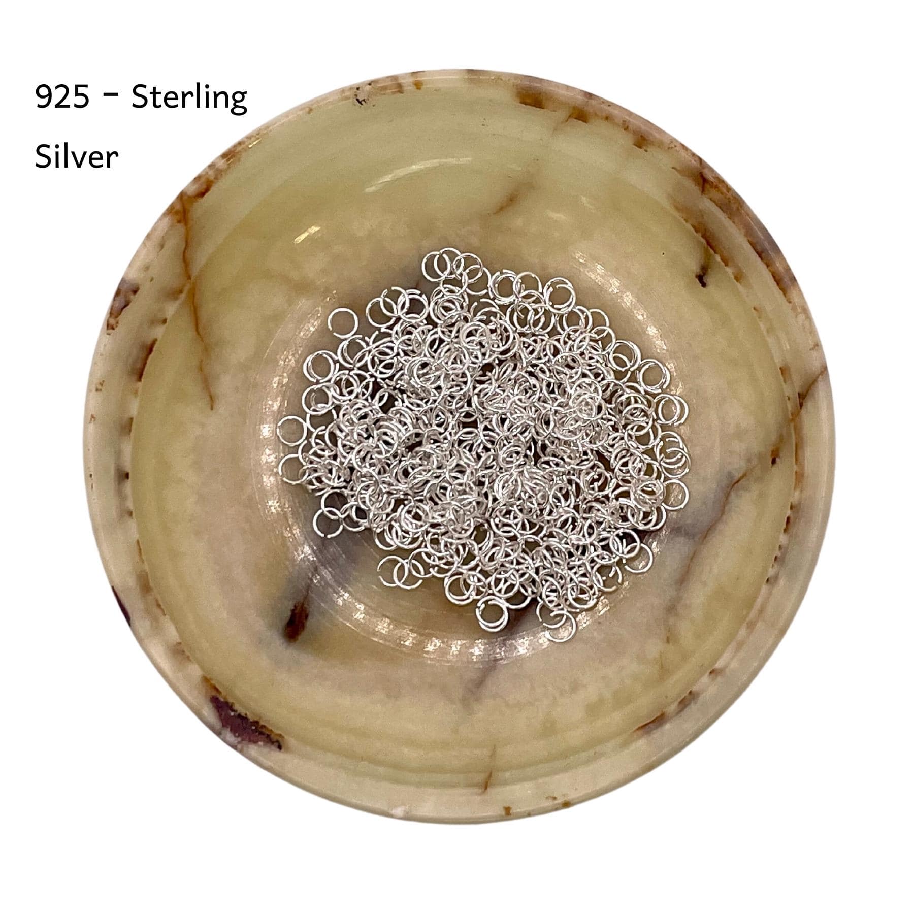 Bulk 925 Sterling Silver Jump Rings in a plate.