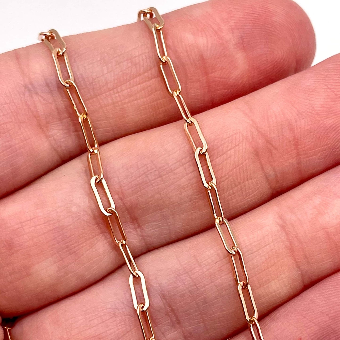 Actual photo of 14k Rose Gold Filled Paperclip chain for permanent jewelry.