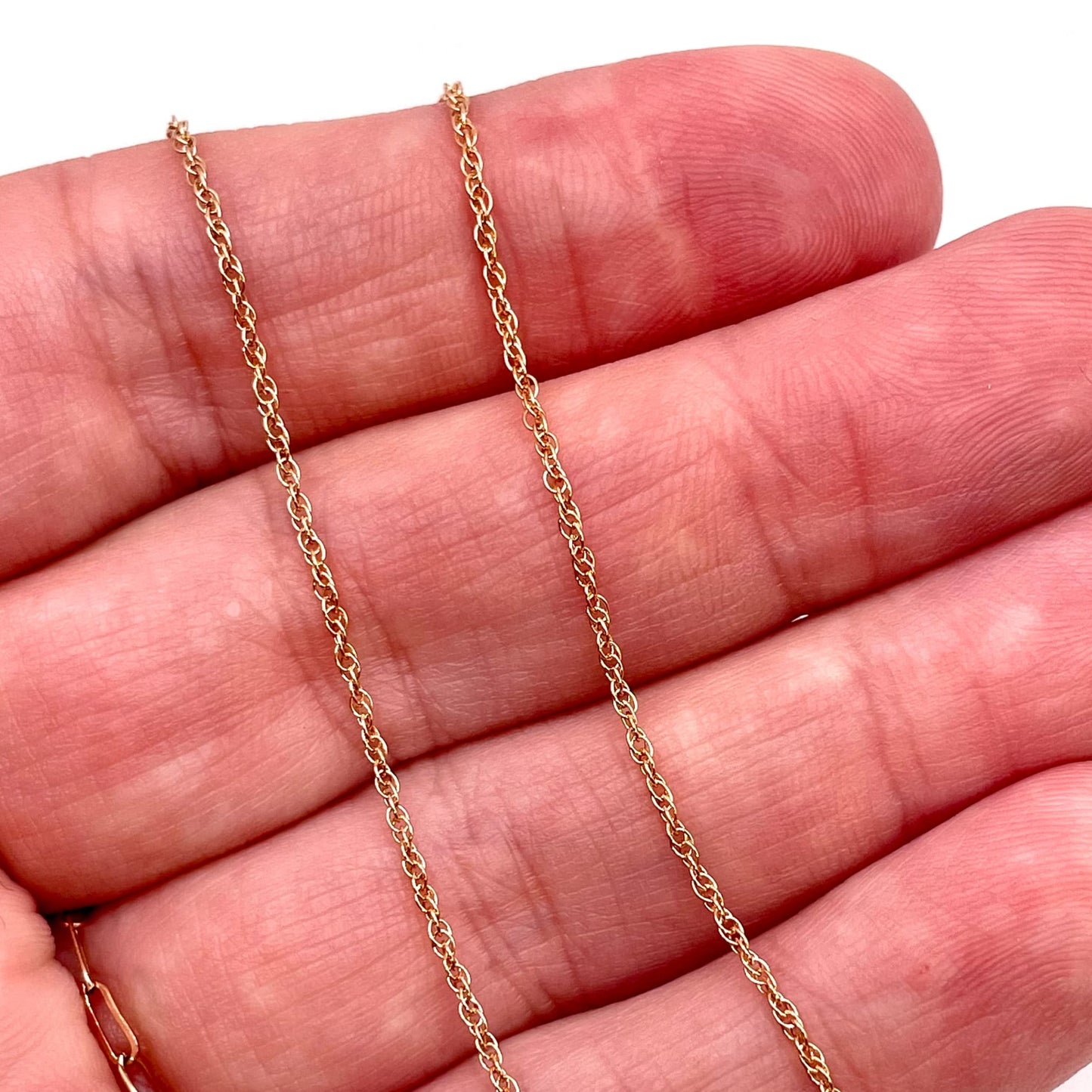 Actual photo of a 14k rose gold filled rope chain for permanent jewelry.