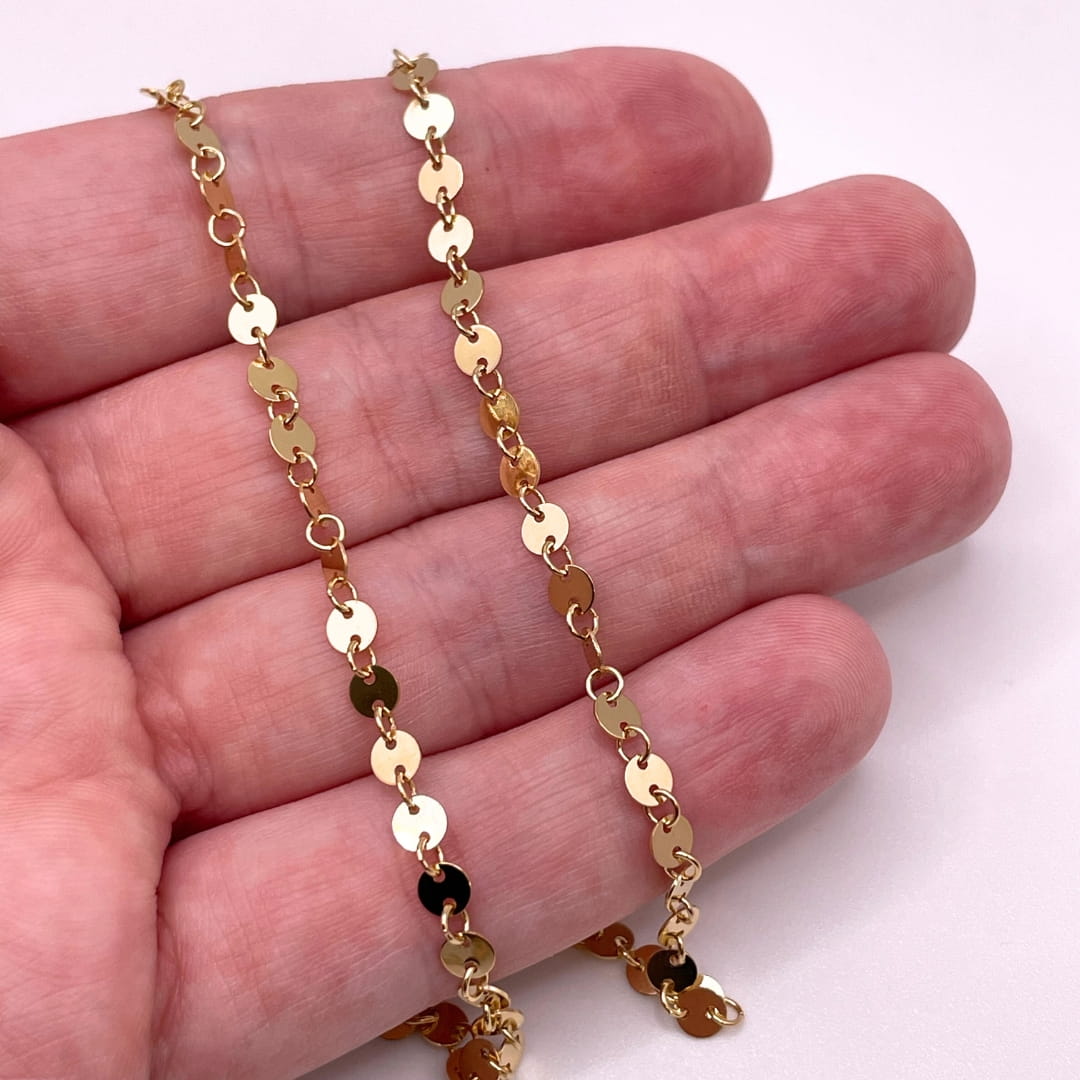 Actual photo of 14k Gold Filled Round Sequin Disc chain for permanent jewelry.