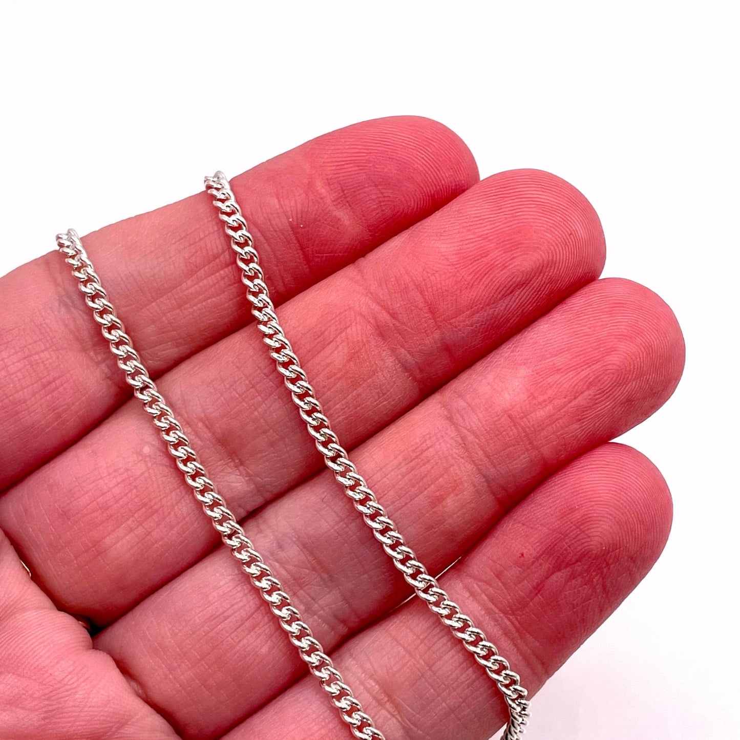 Actual photo of 925 sterling silver curb chain for permanent jewelry.