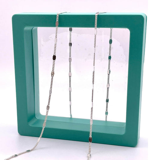 925 sterling silver spacer chain for permanent jewelry in a green hallow box.