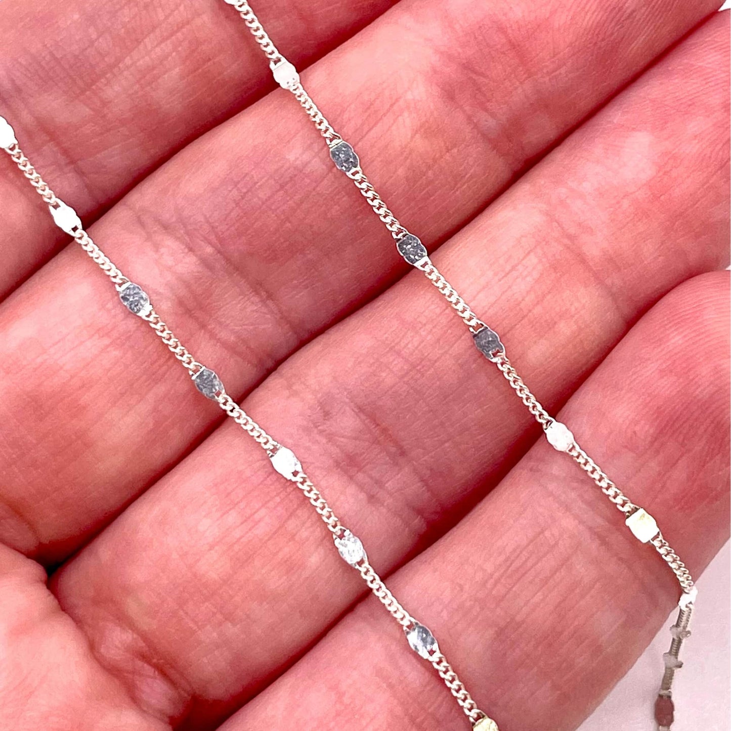 Actual photo of 925 sterling silver spacer chain for permanent jewelry.